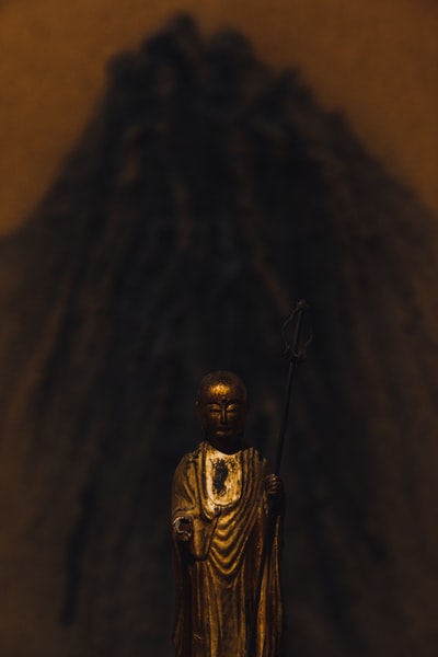 Brown robe statue
